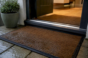 Doormat Placement for Homeowners: Why Two Mats Stop Trips and Rot